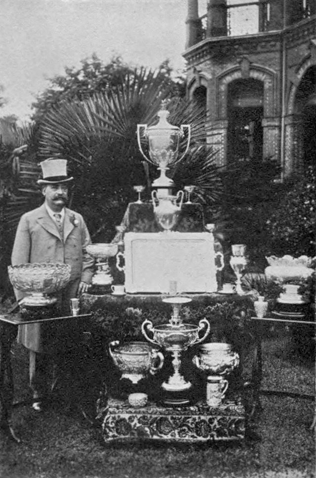 Tcitp_d508_shanghai_horse_racing_fan_and_his_trophies.jpg